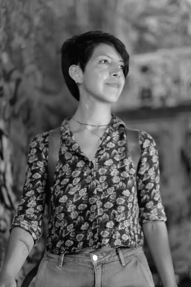 Photos of Ursula going on a walk, holding a instant camera, and exploring the city.