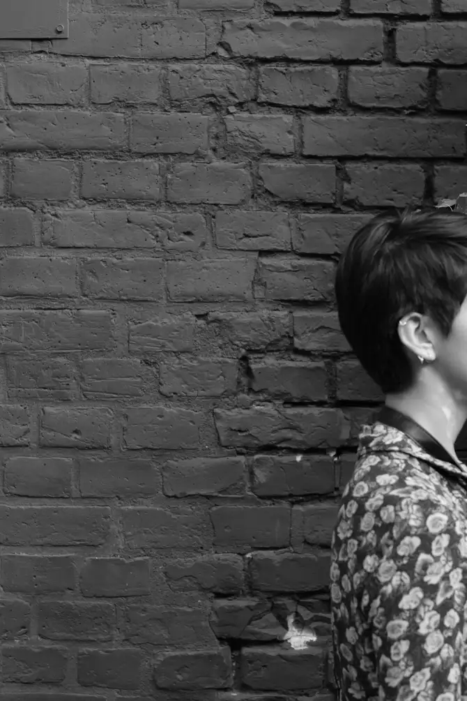 Photos of Ursula going on a walk, holding a instant camera, and exploring the city.